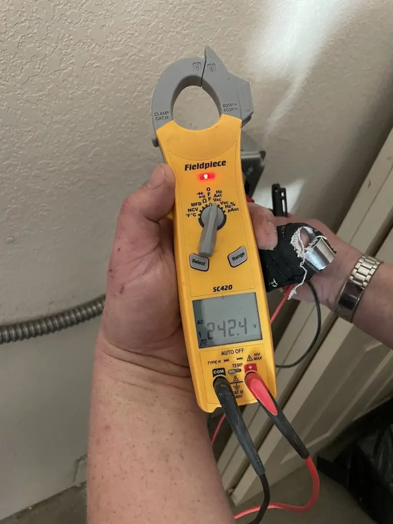 Voltage testing with clamp meter during Electrical Installation Services in Rancho Cucamonga